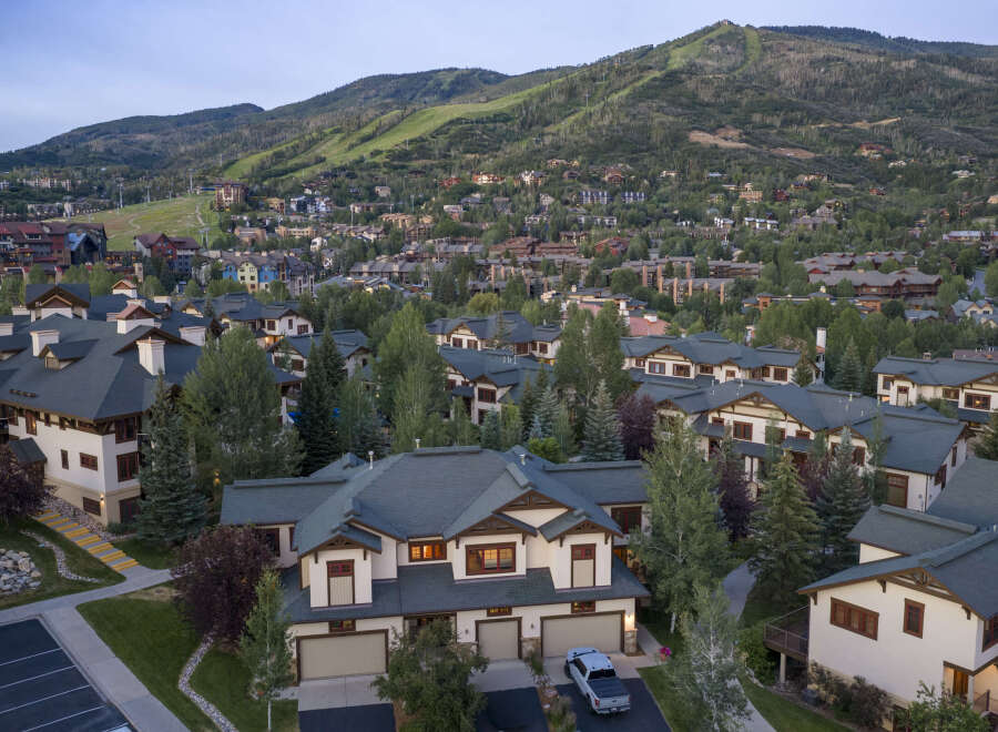 Experience luxury mountain living in this stunning property, nestled amidst a picturesque landscape with breathtaking views of the ski slopes and surrounding evergreen forests.