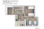Explore this spacious floor plan at EagleRidge Townhomes, featuring a comfortable living area with a sofa and armchairs, perfect for relaxation.