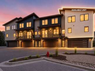 Discover modern luxury living in this stunning townhouse featuring a sleek, contemporary design with multiple levels and attached garages.