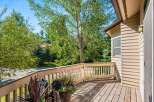 Enjoy the outdoors from this charming deck, perfect for morning coffee or evening relaxation.