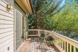 Enjoy the outdoors from this charming deck, perfect for morning coffee or evening relaxation.