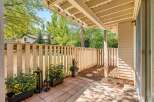 Enjoy outdoor living on this charming patio, perfect for relaxing or entertaining.