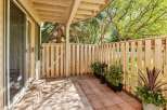 Enjoy outdoor living on this charming patio, perfect for relaxing or entertaining.