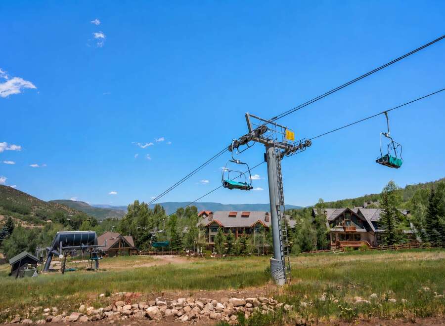 Experience the ultimate mountain lifestyle with this stunning property featuring a private ski lift, perfect for accessing the slopes directly from your doorstep.
