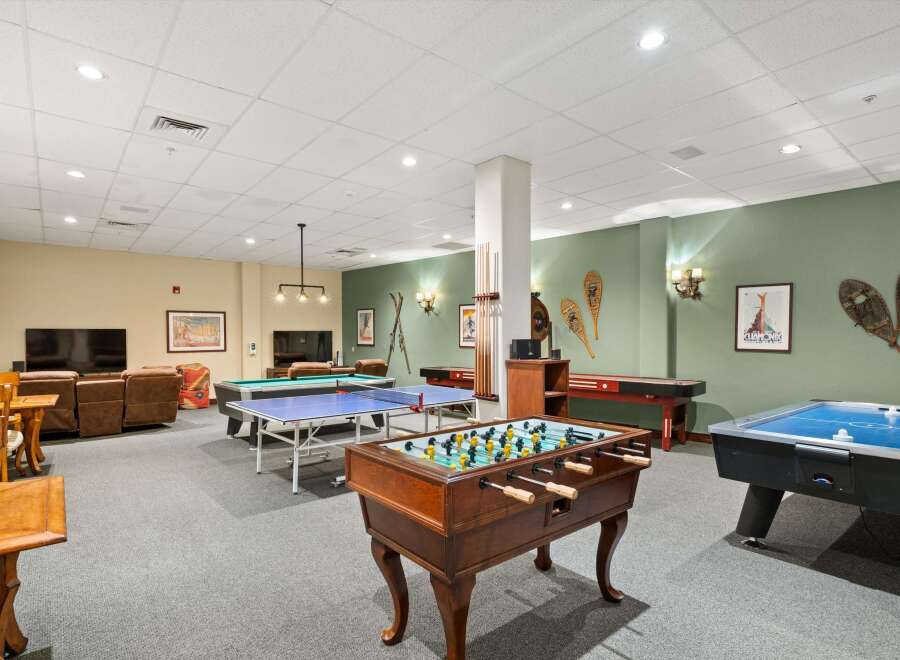 This spacious game room offers endless entertainment with a variety of classic games.