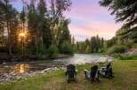 Experience serene living with this stunning property featuring a tranquil riverfront setting.