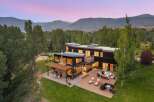 Experience modern luxury in this stunning contemporary home, nestled amidst breathtaking mountain views.
