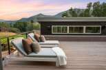 Experience breathtaking mountain views from this modern deck, perfect for relaxation and entertaining.