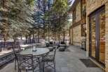 Enjoy outdoor living on this spacious stone patio, perfect for entertaining.