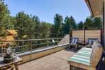 Enjoy the serene mountain views from this expansive deck, perfect for outdoor relaxation and entertaining.