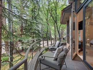 Enjoy the serene mountain views from this charming balcony, perfect for morning coffee or evening relaxation.