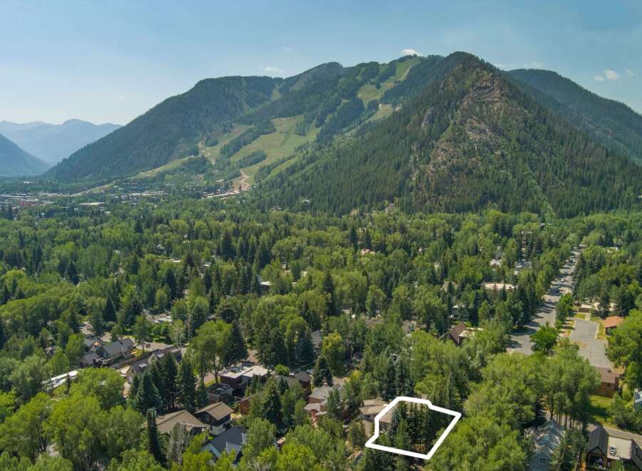 Nestled amidst lush greenery, this property offers a serene escape with stunning mountain views.