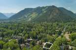 Nestled amidst lush greenery, this property offers a serene escape with stunning mountain views.