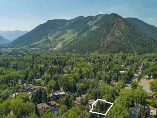 Nestled amidst lush greenery, this property offers a serene escape with stunning mountain views.
