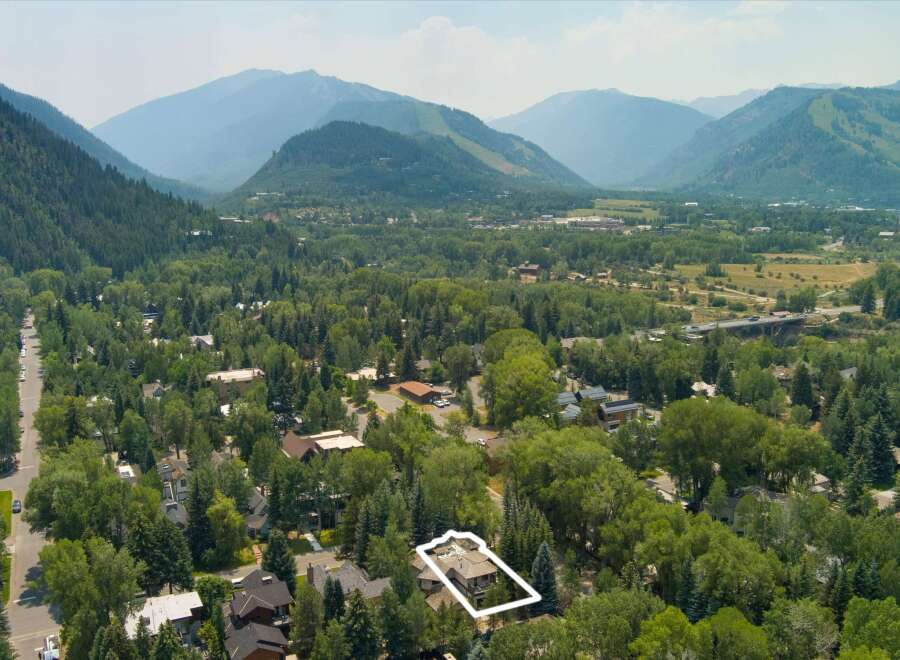 Nestled amidst lush greenery and majestic mountains, this property offers a serene retreat with stunning natural surroundings.