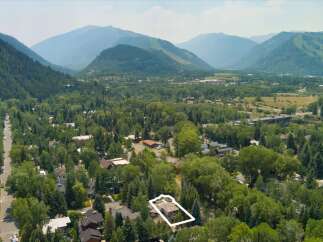 Nestled amidst lush greenery and majestic mountains, this property offers a serene retreat with stunning natural surroundings.