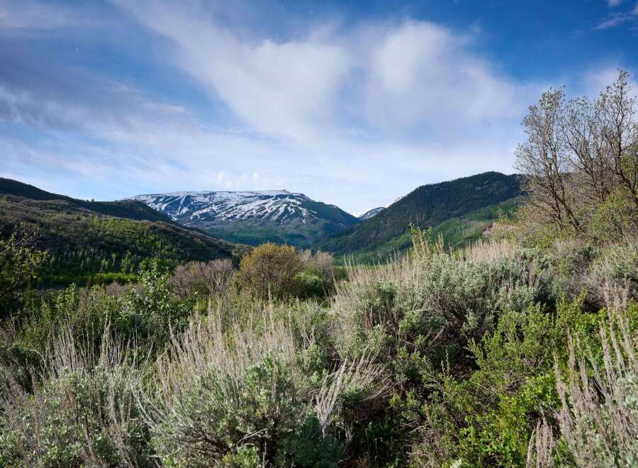 Discover breathtaking mountain views from this stunning property, featuring snow-capped peaks and lush green valleys.