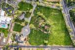 Discover this expansive estate featuring a modern residence with a sparkling pool and a separate guest house.