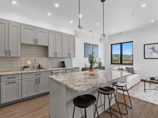 Experience modern living in this stunning open-concept kitchen and living area.