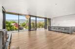 Experience modern living with breathtaking mountain views from this stunning open-concept space.