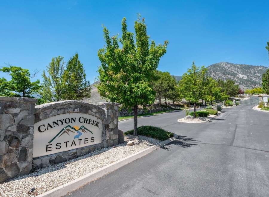 Welcome to Canyon Creek Estates, a prestigious community offering a serene and luxurious living experience.