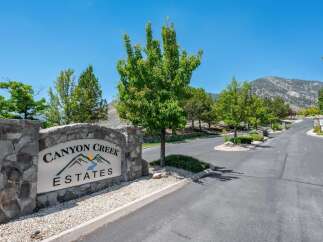 Welcome to Canyon Creek Estates, a prestigious community offering a serene and luxurious living experience.