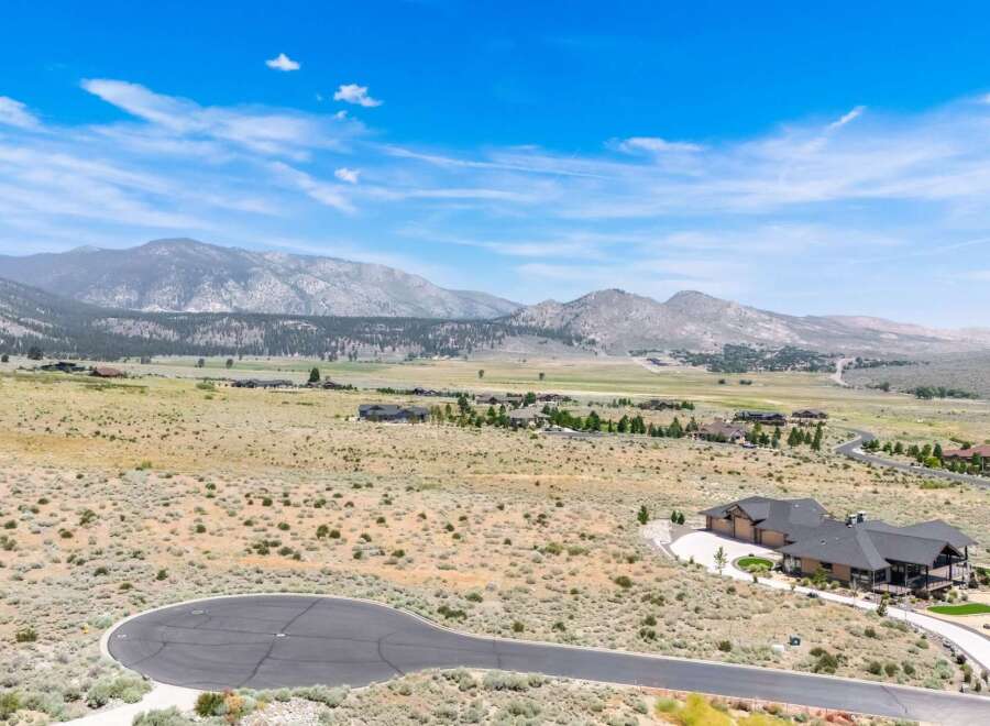 Discover luxury living in this stunning mountain estate, offering breathtaking panoramic views of the surrounding landscape.