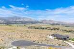 Discover luxury living in this stunning mountain estate, offering breathtaking panoramic views of the surrounding landscape.