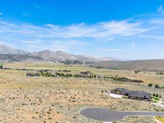 Discover luxury living in this stunning estate, nestled amidst rolling hills and breathtaking mountain vistas.