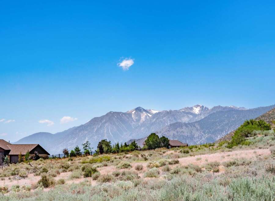 Nestled against a backdrop of majestic snow-capped mountains, this property offers a serene escape with stunning natural beauty.