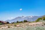 Nestled against a backdrop of majestic snow-capped mountains, this property offers a serene escape with stunning natural beauty.