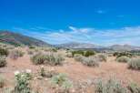 Discover this stunning property nestled amidst rolling hills and vast open spaces, offering breathtaking panoramic views of the surrounding mountains.