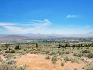 Experience breathtaking panoramic views from this stunning property, offering a serene escape into nature.