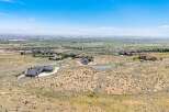 Discover luxury living in this expansive estate, offering breathtaking panoramic views of the valley and distant mountains.