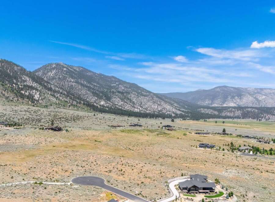 Experience luxury living in this stunning estate nestled amidst breathtaking mountain views.