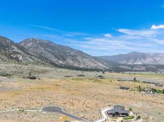 Experience luxury living in this stunning estate nestled amidst breathtaking mountain views.