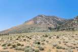 Discover your dream home nestled against a majestic mountain backdrop.