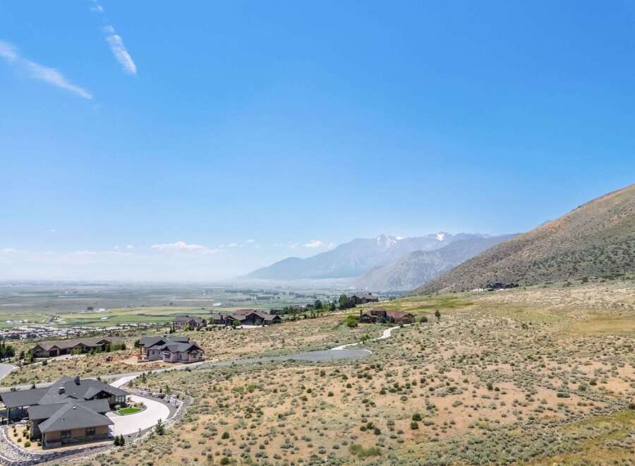 Experience luxury living with breathtaking mountain views from this stunning property.