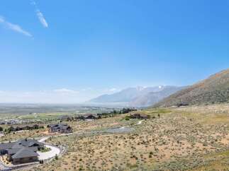 Experience luxury living with breathtaking mountain views from this stunning property.