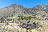 Experience luxury living in this stunning mountain-view estate, perfectly situated amidst rolling hills and mature trees.