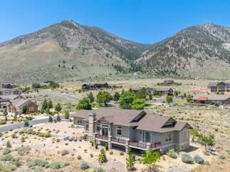 Experience luxury living in this stunning mountain-view estate, perfectly situated amidst rolling hills and mature trees.
