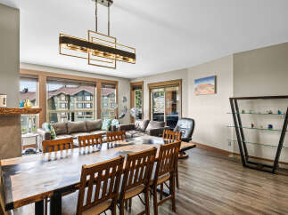Experience luxurious living in this spacious open-concept dining and living area, perfect for entertaining.