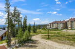 Experience mountain living in this stunning property offering breathtaking views of rolling hills and lush forests.