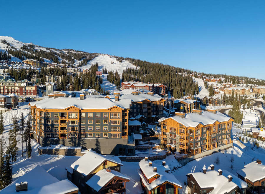Experience luxury mountain living in this stunning ski-in/ski-out property, offering breathtaking views and direct access to pristine slopes.