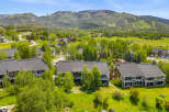 Discover this stunning mountain property featuring multiple units with spacious balconies and scenic views.