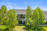Experience the beauty of this multi-level home, nestled amidst lush greenery and mature trees.