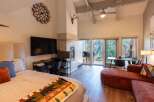 Experience breathtaking mountain views from this stunning studio, featuring a cozy fireplace and a spacious balcony perfect for enjoying the scenery.