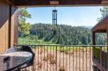 Enjoy breathtaking mountain views from this charming balcony, complete with a table and chairs for morning coffee or evening relaxation.