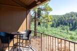 Enjoy breathtaking views from this charming balcony, perfect for morning coffee or evening relaxation.
