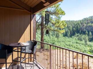 Enjoy breathtaking views from this charming balcony, perfect for morning coffee or evening relaxation.